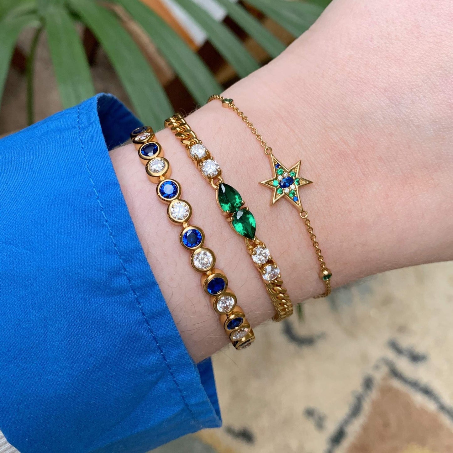 Elegant colourful bracelet stacks. Nova north star chain bracelet styled with vintage look tennis and stacking bracelets