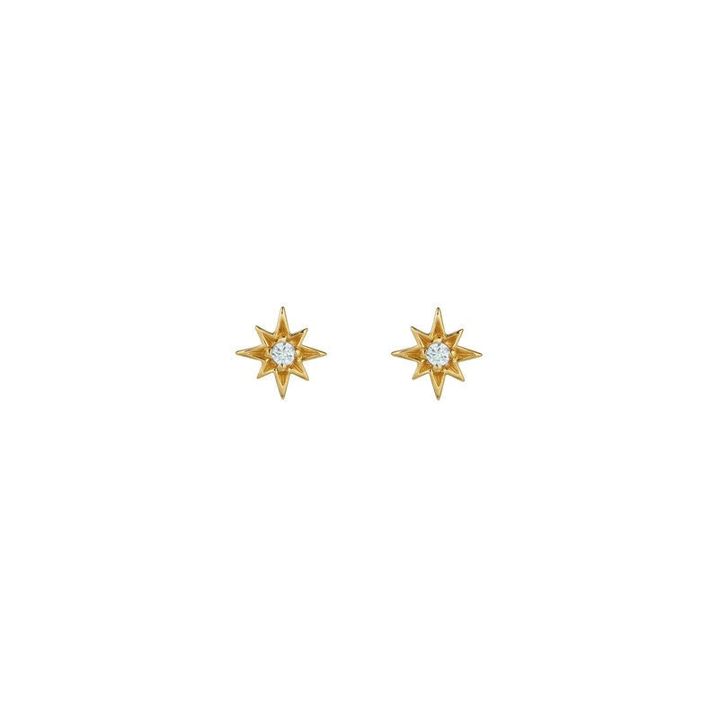 Ziggy Micro North Star stud earrings in 18k gold plating with aquamarine cubic zirconia stars