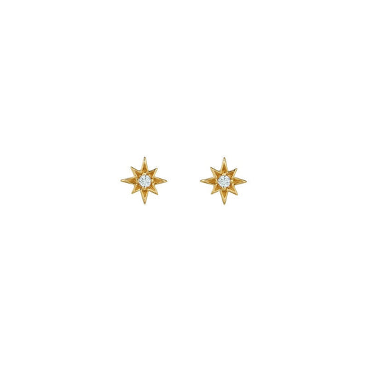 Ziggy Micro North Star stud earrings in 18k gold plating with aquamarine cubic zirconia stars