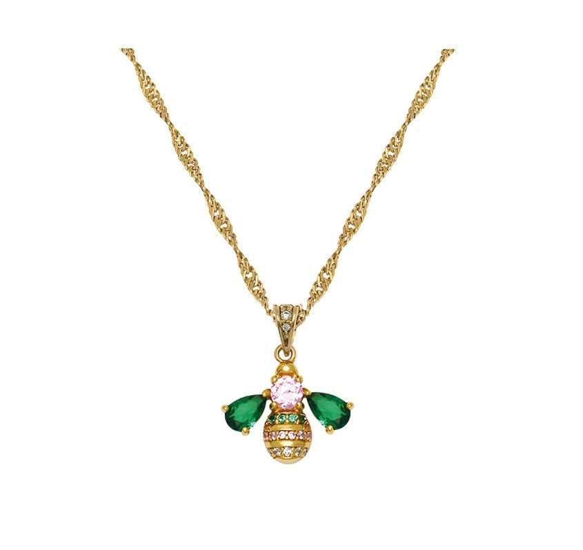 Gold necklace with a jewelled bee pendant featuring emerald green wings and a blush pink center from the Beatrice Jewelled Bee Collection