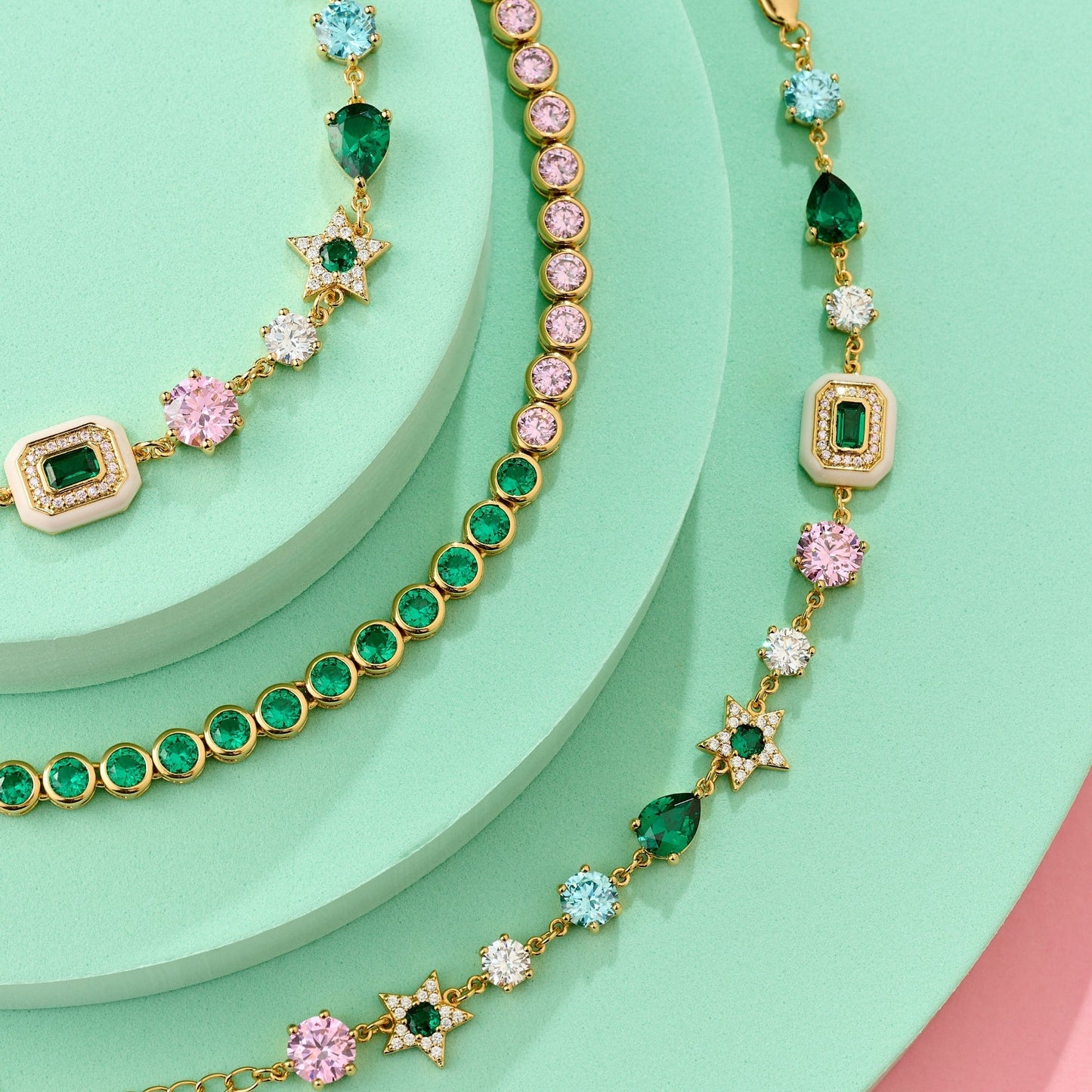 Colourful Tennis Bracelet, Dotty Blush Pink, Emerald Green & Gold on pink and mint green background