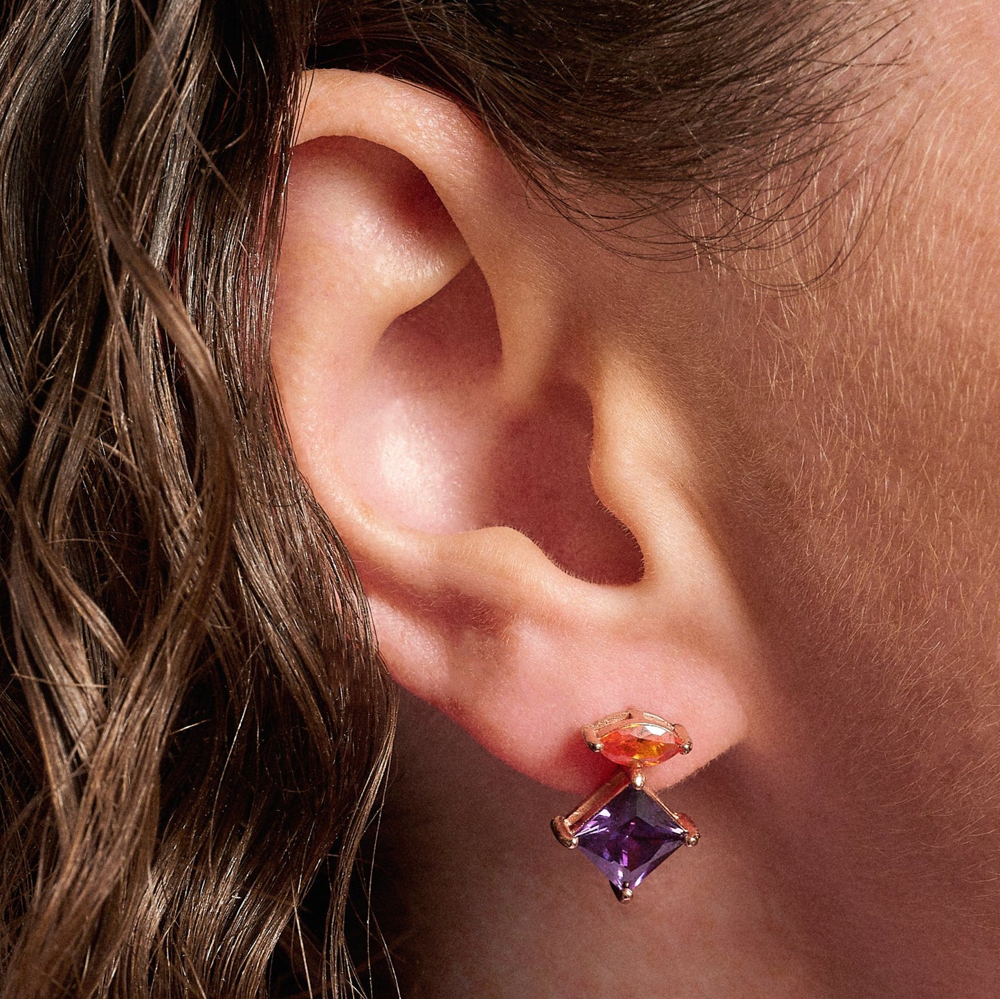 Colourful Rose Gold Stud Earrings, esme orange and amethyst studs in ear