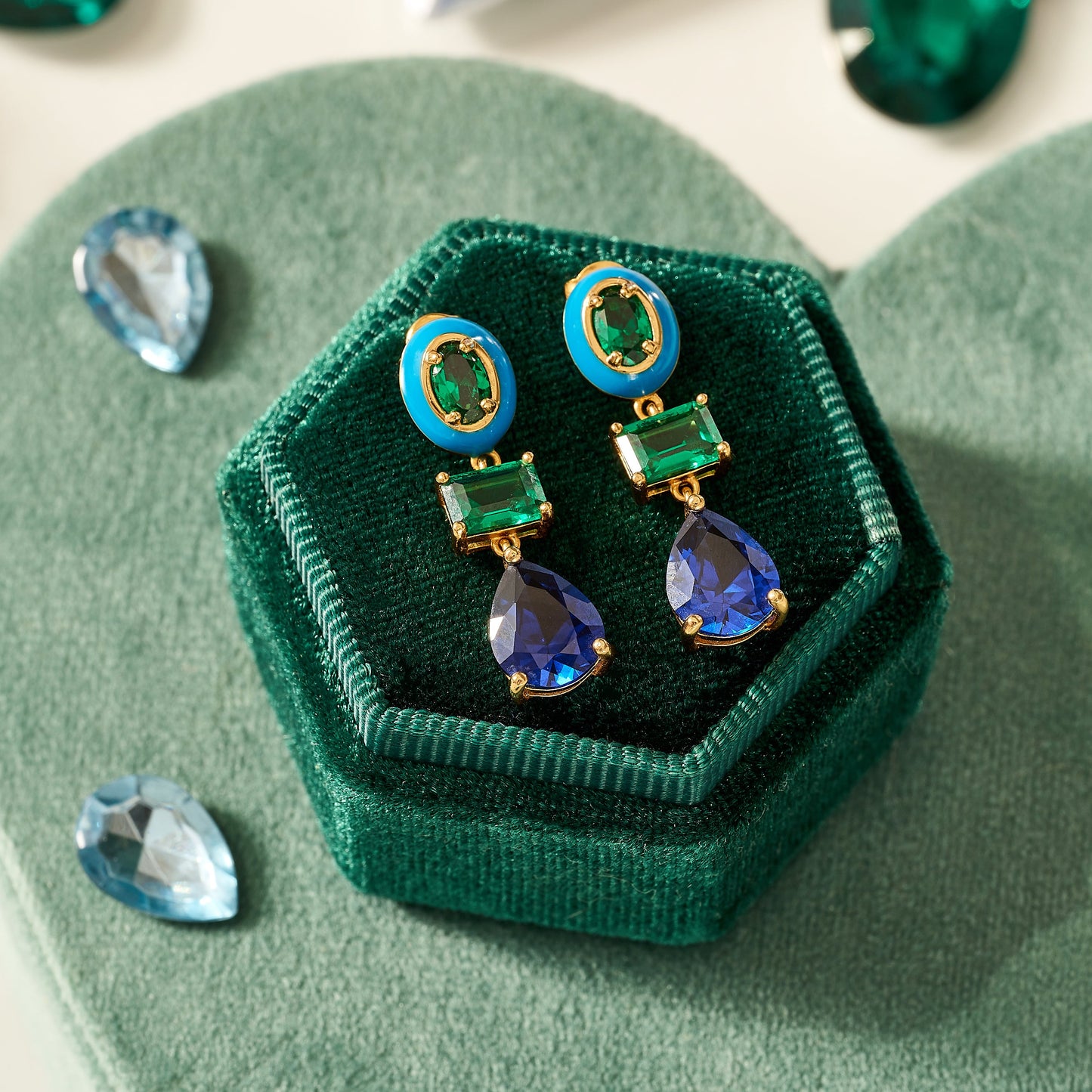 Green Statement Earrings Frida Enamel Drop Studs, Blue, Green & Gold in green hexagon packaging