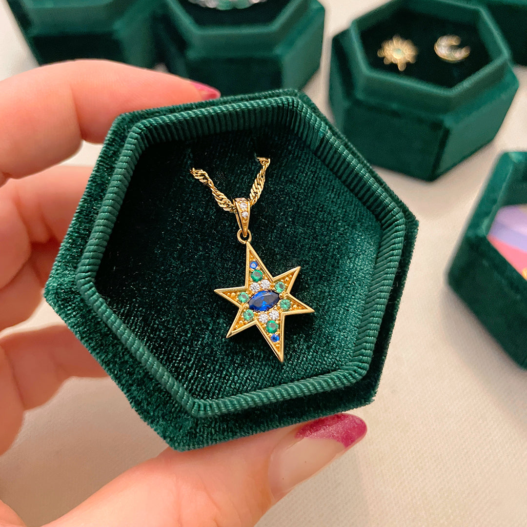 Nova North Star Pendant Necklace Sapphire Blue Green and Gold in packaging picture