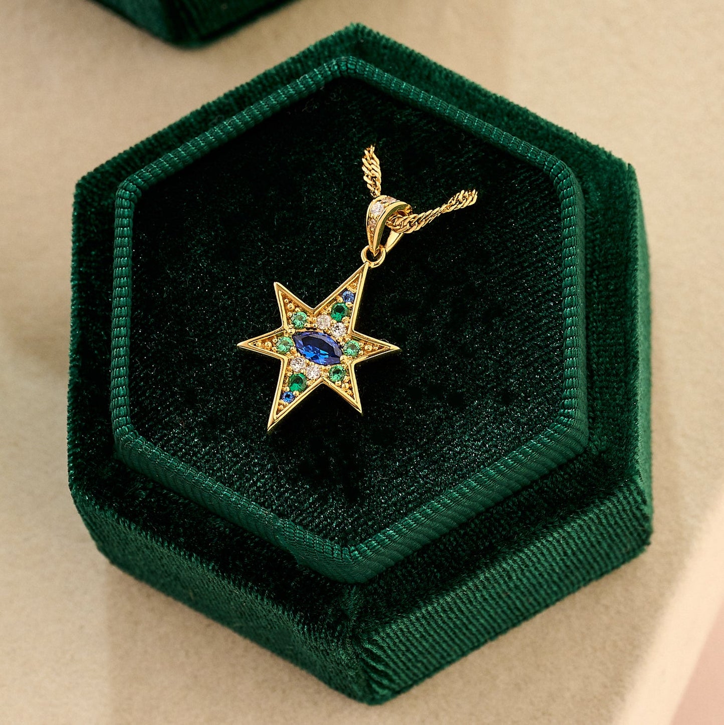 Nova North Star Pendant Necklace Sapphire Blue Green and Gold in box