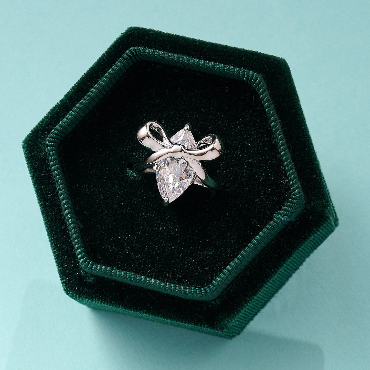 Amelia Bow Ring with clear marquise cubic zirconia and silver bow in green velvet box