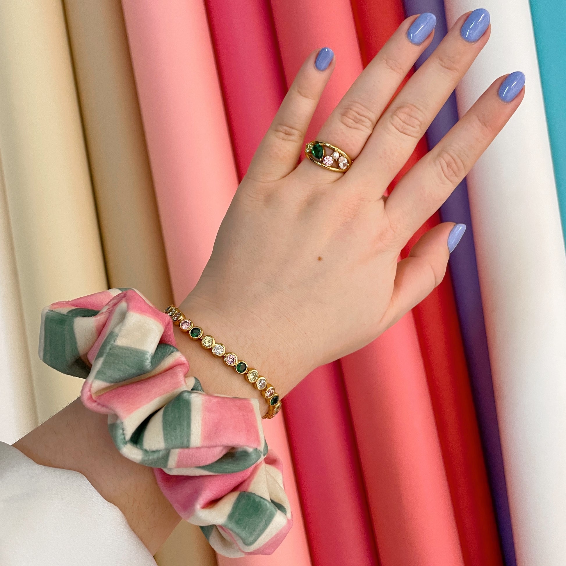 colourful hair tie on wrist